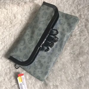 Animal print knuckle ring fold bag